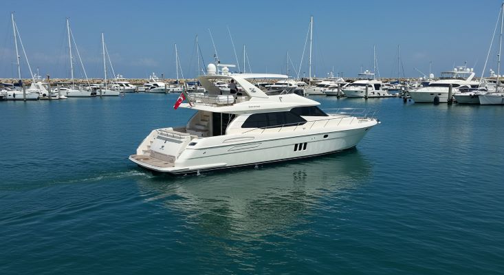 Boat using stern thruster for docking in marina